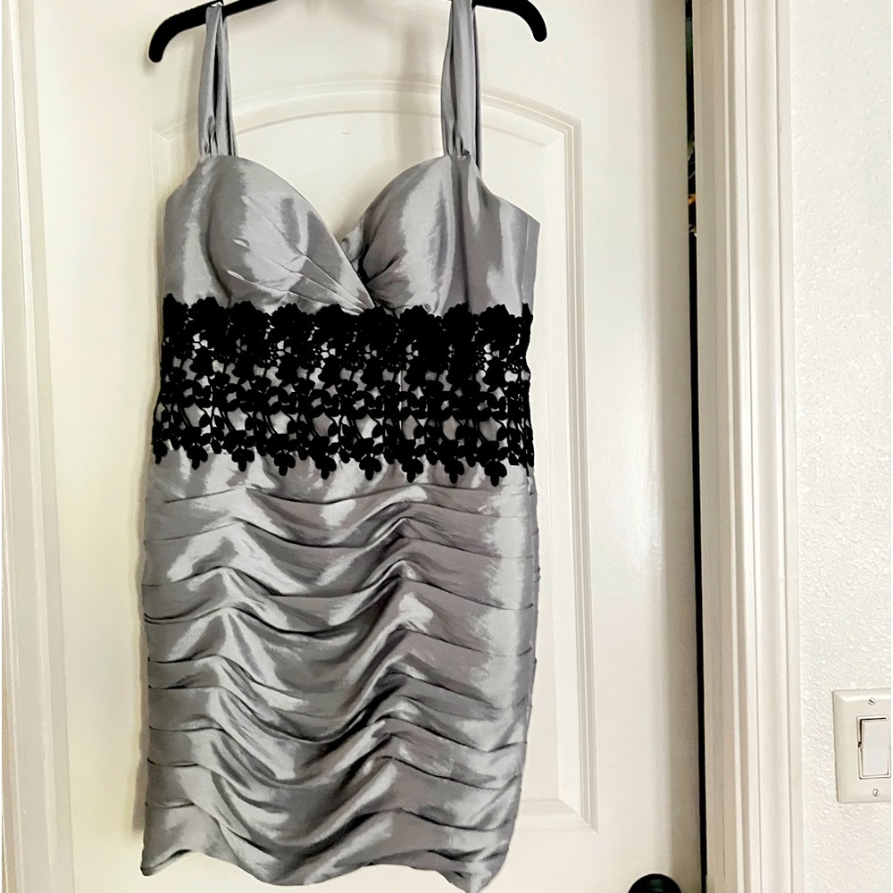 Brand new Formal dress with cover- never worn.  The zipper needs to be repaired.